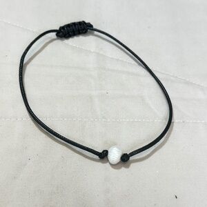 Single White Freshwater Pearl adjustable bracelet on black cord